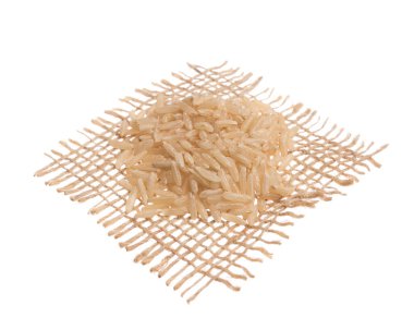 Oryza sativa Çin pirinç tohumunun bilimsel adıdır. Yapışkan kumaş üzerinde tahıllar, izole beyaz arkaplan.