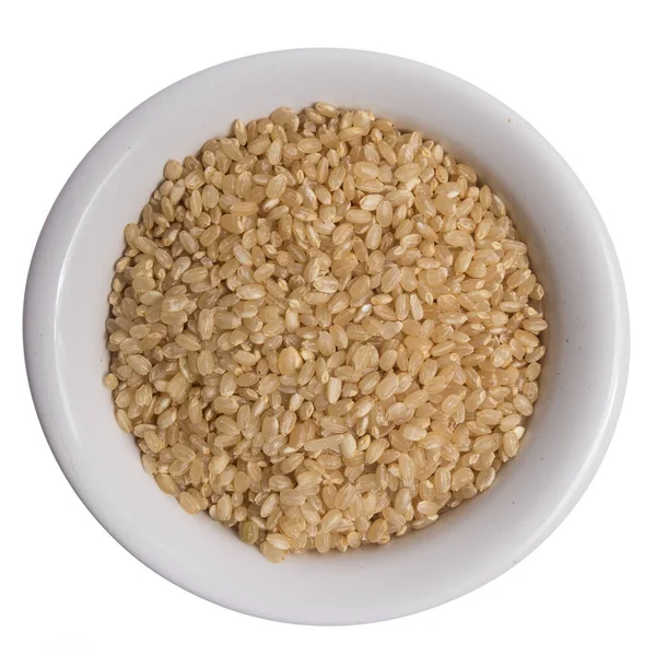 水稻是中国稻种的学名 陶瓷碗上的颗粒的顶部视图 被隔离了 — 图库照片