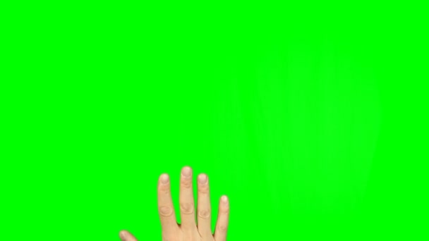 绿色屏幕上有手指的角的标志 用一只手的手指在石板上做着沉重的金属手势 高加索年轻人的镜头包含了坚实的绿色 而不是阿尔法通道容易键控 — 图库视频影像
