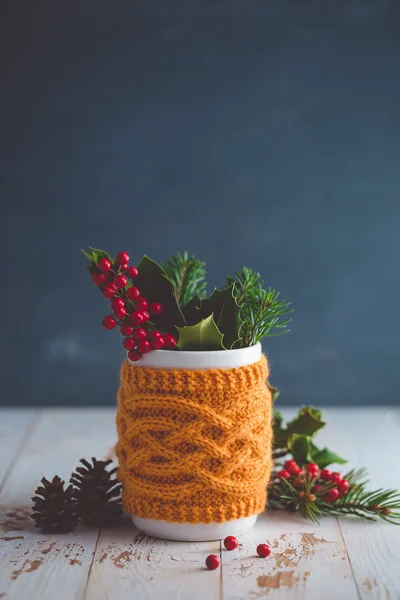 Christmas arrangement of holly berries — Stockfoto