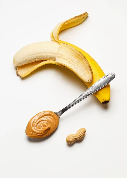 Banane mit Erdnussbutter — Stockfoto