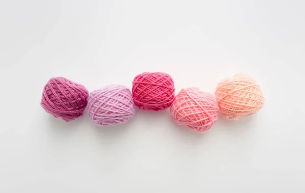 Knitting yarn balls in pink tone. — Stock Photo, Image