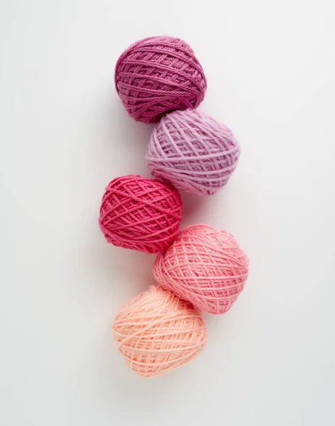 Knitting yarn balls in pink tone. — Stock Photo, Image