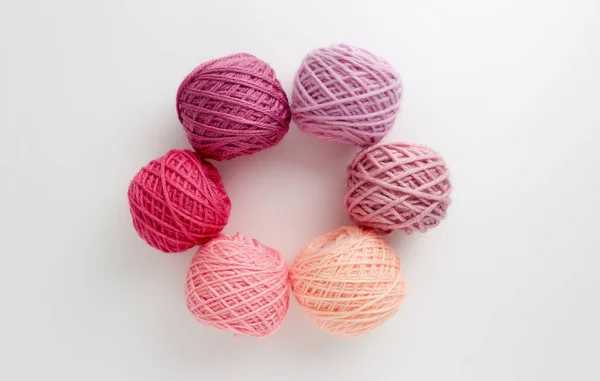 Knitting yarn balls in pink tone. — Stock Photo, Image