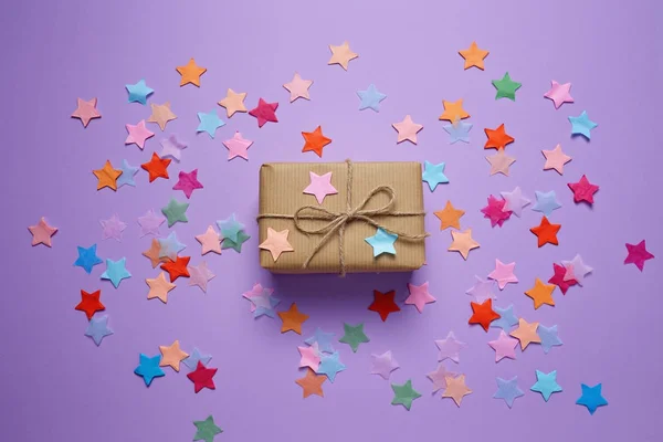 Christmas present in craft paper — Stock Photo, Image