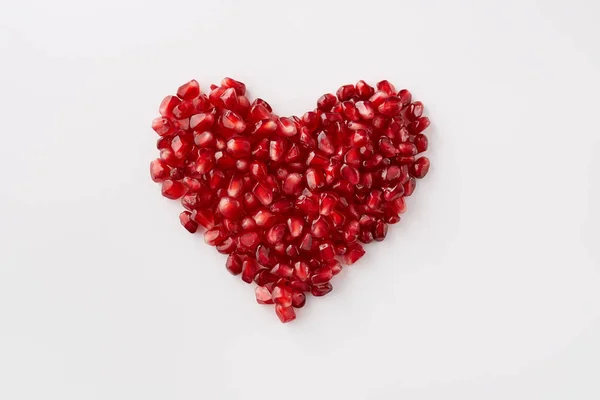 Pomegranate Seeds Shape Heart White Background — Stock Photo, Image