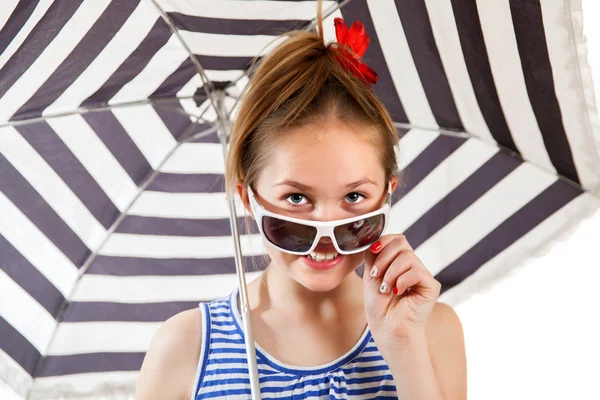Attractive girl is looking over suglasses — Stock Photo, Image