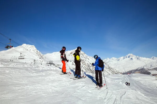 Three Young Skiers Mirrored Masks Top Sunny Day — Stock Photo, Image