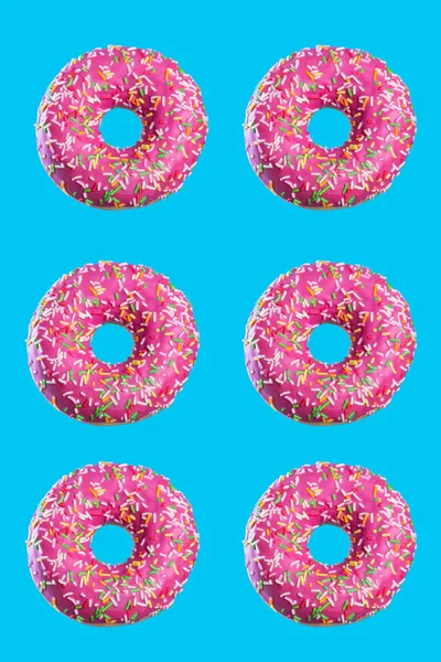 Donuts auf einheitlichem Hintergrund hängen in der Luft. Sechs Donuts — Stockfoto