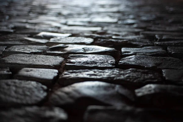 Achtergrond textuur oude weg van grote oude stenen bladeren in perspectief — Stockfoto