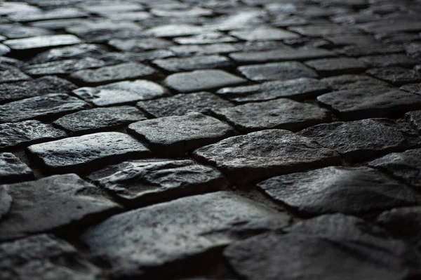 Achtergrond textuur oude weg van grote oude stenen bladeren in perspectief — Stockfoto