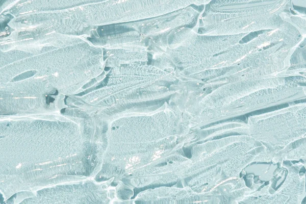 Kompresser av trasparent gel på blå bakgrund — Stockfoto