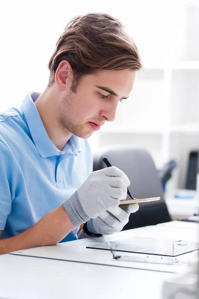 Man working with computers and electronics. — Stock Photo, Image