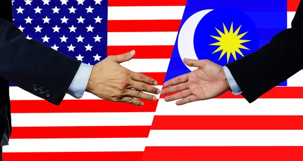 Ein Geschäftsmann schüttelt sich die Hand, USA und Malaysia — Stockfoto