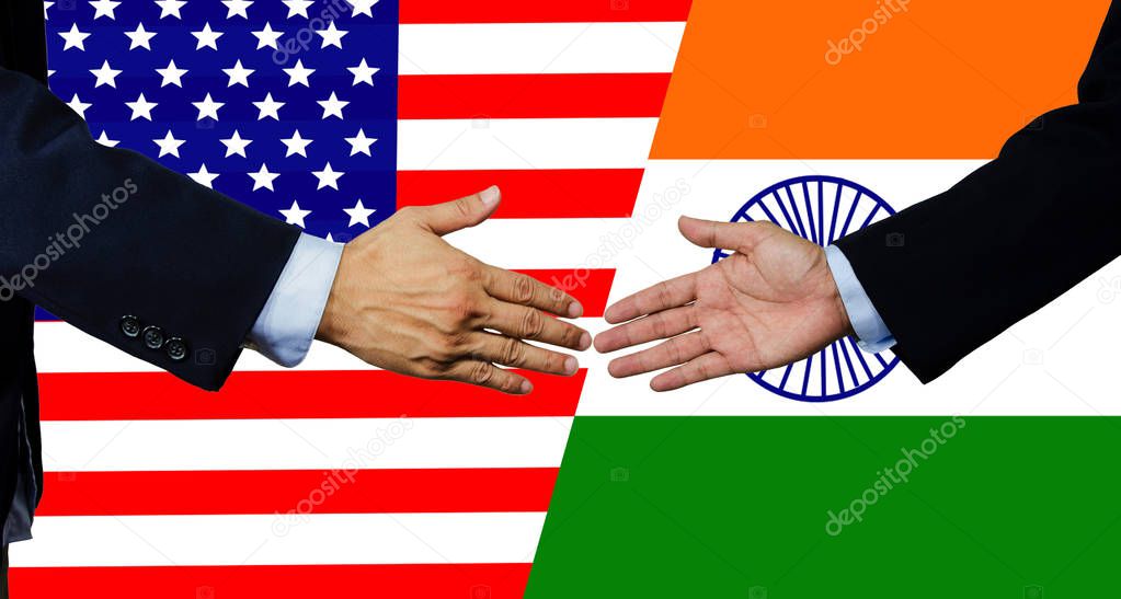 A business man shake each other hand, USA and India