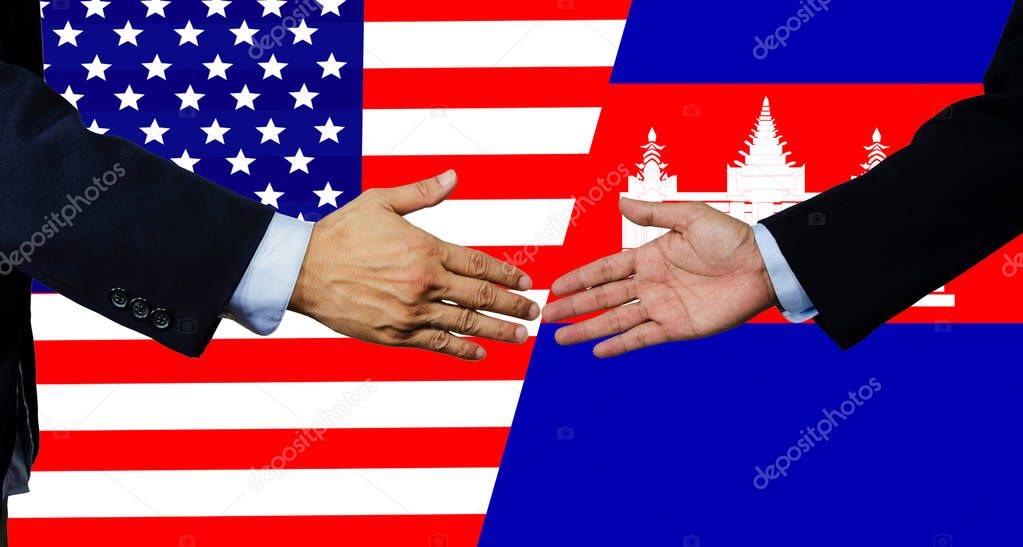 A business man shake each other hand,USA and Cambodia