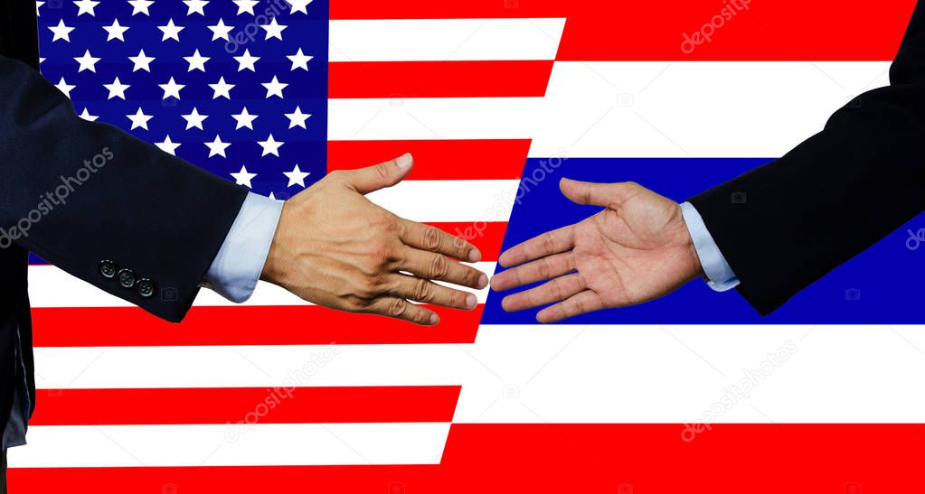 A business man shake each other hand,USA and Thailand