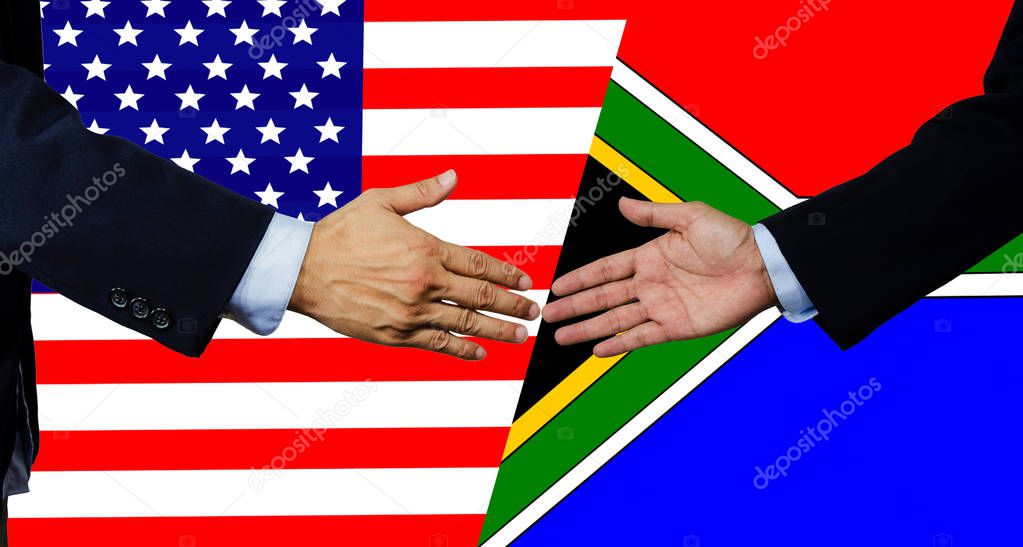 A business man shake each other hand,USA and Brasil