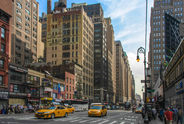 New York, USA - June 12, 2014: The main street of the city of New York Broadway