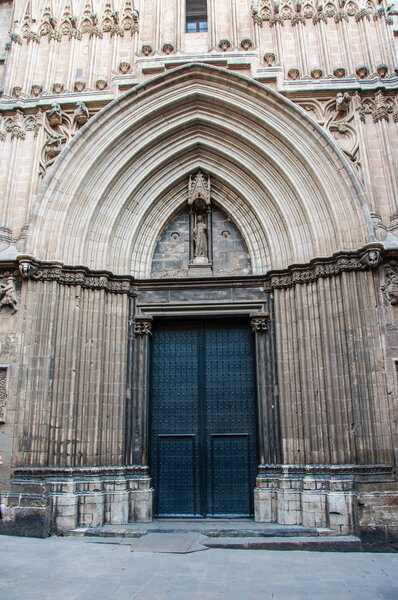 Ancient door in the church, Barcelona, Spain