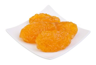 Beyaz zemin üzerinde kurumuş armut