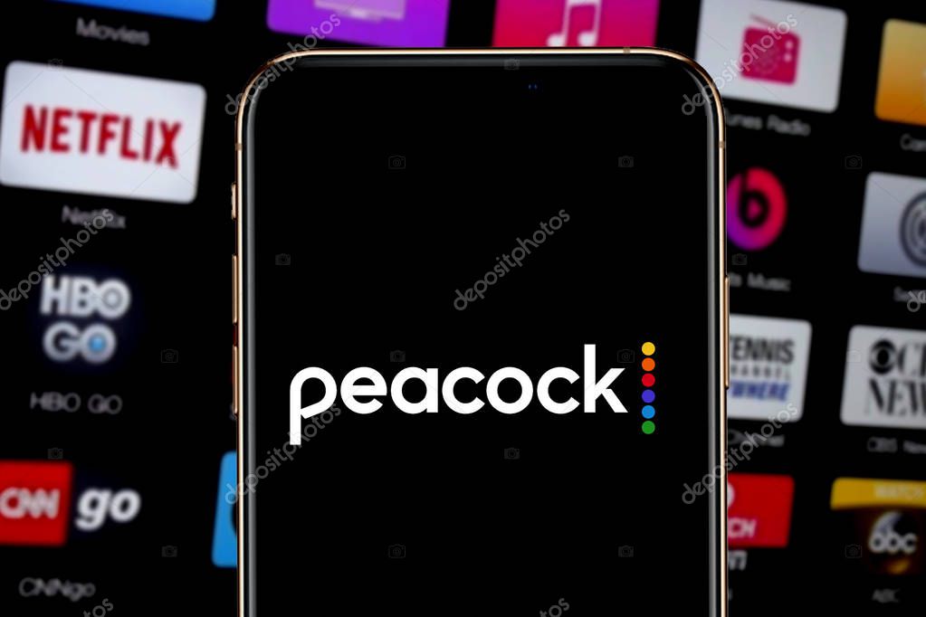 Iphone 11 pro with the Peacock logo and Netflix  which is an upcoming video on demand service. The service will be launched in April 2020United States, New York, Saturday November, 2019