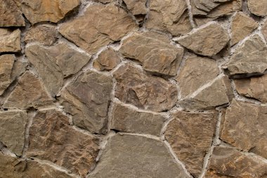 Taştan yapılmış ev duvarı.