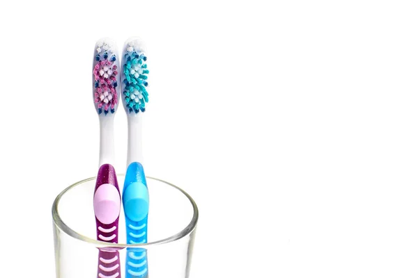 Blue Pink Toothbrushes Glass Isolated White Background Copy Space Healthcare — Stock Photo, Image