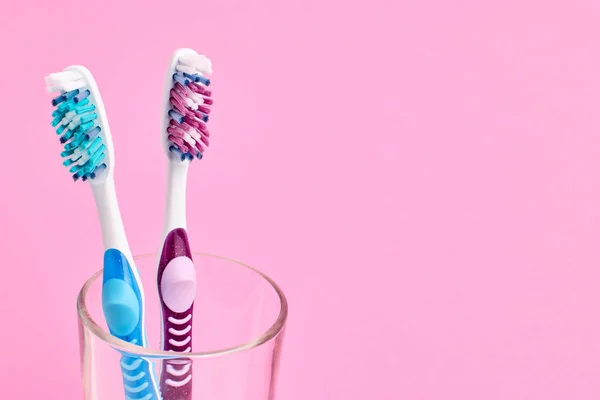 Pink Blue Toothbrushes Glass Bright Background — Stock Photo, Image