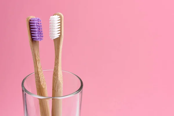 Two Bamboo Toothbrush Close Glass Pink Background Eco Frendly Zero — Stock Photo, Image