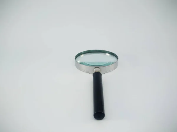 Magnifying glass isolated on white background Stock Photo