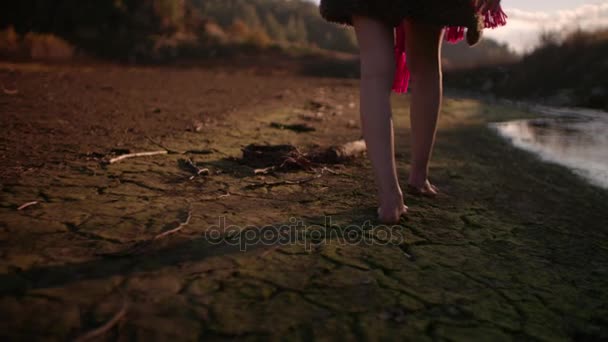 Woman 's legs walking barefoot — стоковое видео