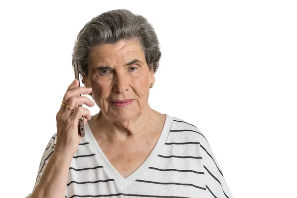 Пожилая Женщина Смотрит Камеру Звонит Мобильный Телефон Используя Социальную Службу — стоковое фото