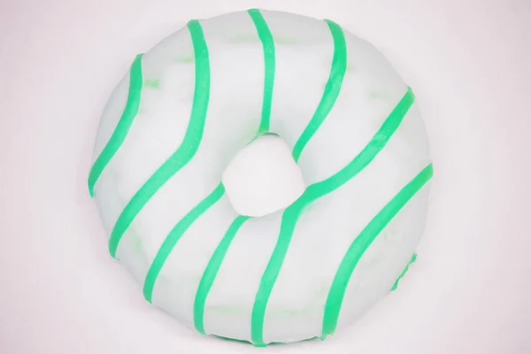 Donut verde vista superior. Fundo branco — Fotografia de Stock