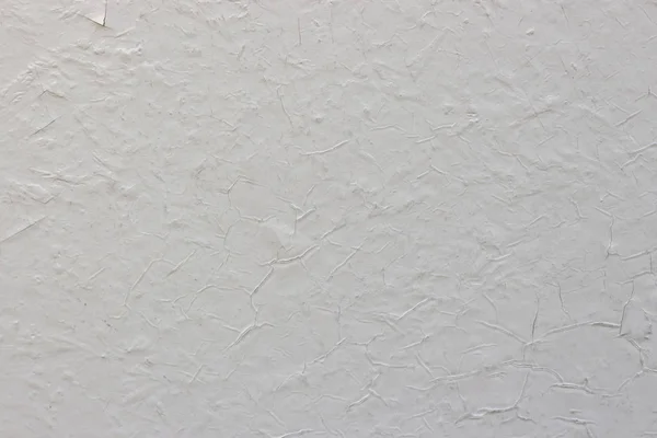 Old white cracked paint on the concrete wall. Texture, pattern, — 스톡 사진