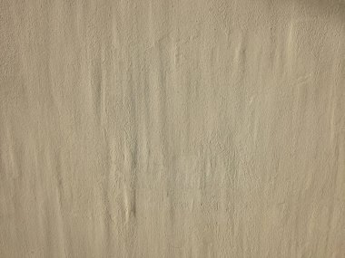 Arkaplan ve tasarım sanatı için sarı grunge beton duvar dokusu.