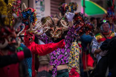 Demon red dancer in traditional party