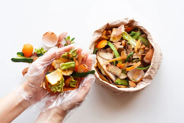 Organic Food Waste Paper Bag Hands White Background Top View — Stock Photo, Image