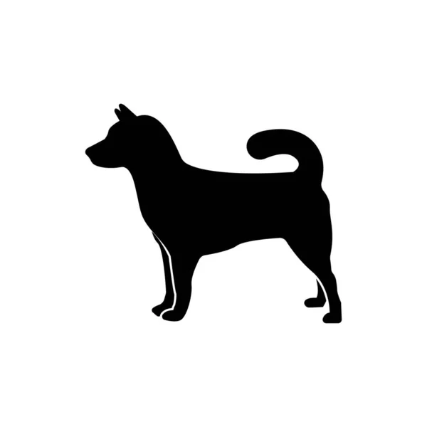 Vector black silhouette of a dog isolated on a white background. — Stock Vector