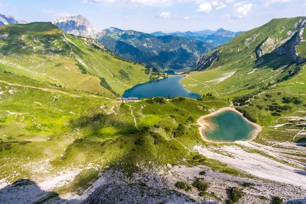 Mountain tour over the Lachenspitze north face via ferrata to the Lachenspitze. Ascent from Vilsalpsee over Traualpsee and Landsberger hut