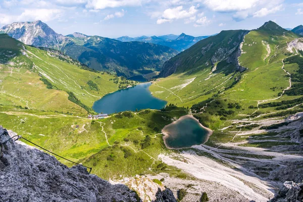 Mountain tour over the Lachenspitze north face via ferrata to the Lachenspitze. Ascent from Vilsalpsee over Traualpsee and Landsberger hut