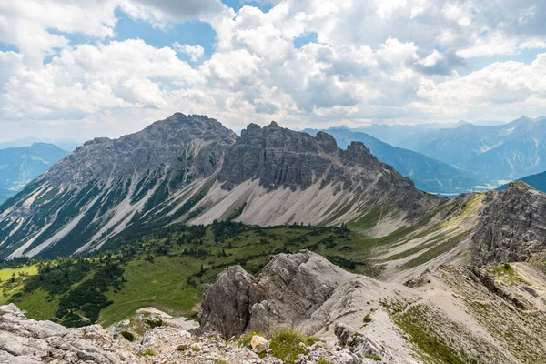 Mountain tour over the Lachenspitze north face via ferrata to the Lachenspitze. Ascent from Vilsalpsee over Traualpsee and Landsberger hut