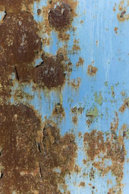 Soyulmuş ve paslı metal doku.