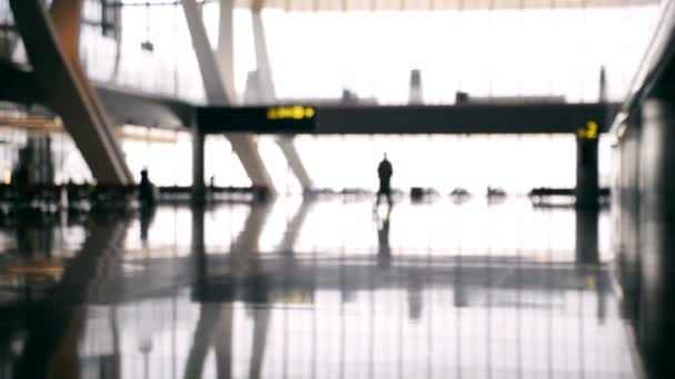 焦机场 Baackground在机场散步的剪影人 — 图库视频影像