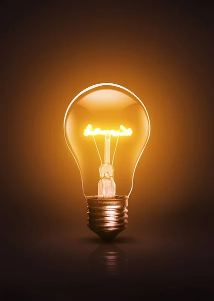 Active bulb on a dark background. — Stock Photo, Image