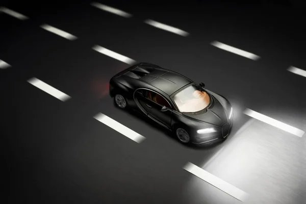 Top view of a Black colored Bugatti Veyron toy car. Stock Photo