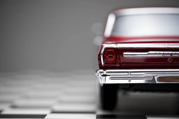Back view of a red colored 1960 Chevrolet Nova toy model car. — Stock Photo, Image