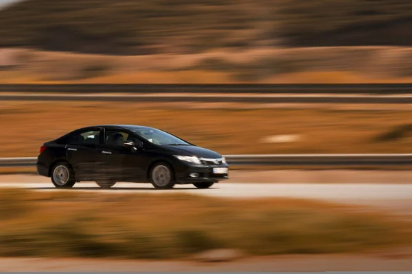 Couleur noire Honda Marque photo de voiture avec pan technique avec mouvement — Photo