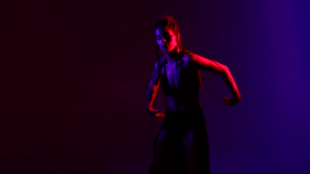 Black Dressed Braided Hair Woman Dancing Blue Red Background — Stock Video