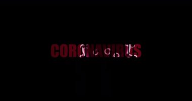 Koronavirüs yazılı metni olan kırmızı arkaplan üzerindeki Soyut Virüs illüstrasyonunun canlandırması. 